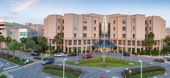 A picture containing building, outdoor, sky, resort Description automatically generated